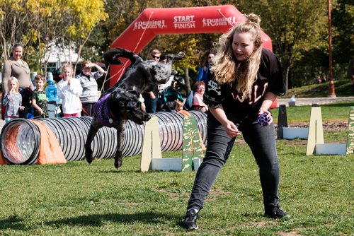 Daniel Crump / Winnipeg Free Press. Sarah Van Renselaar, and her dog Davidson, perform as part of the Wild Dogs performance at the seventh annual Woof Walk in support of Darcy's Animal Rescue Centre. September 14, 2018.