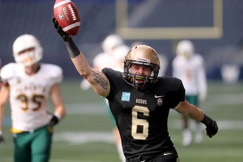 TREVOR HAGAN / WINNIPEG FREE PRESS
Manitoba Bisons' receiver Dylan Schrot (6) begins to celebrate as he runs into the end zone to score a touchdown against the Alberta Golden Bears', Saturday, September 15, 2018.