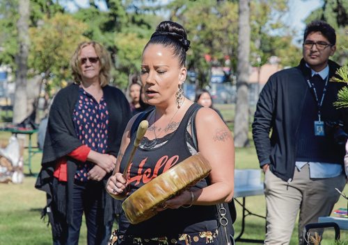 Canstar Community News Sept. 10 - Klinic Community Health hosted an event for World Suicide Prevention Day at Vimy Ridge Memorial Park on Sept. 10. Dream Catchers drummer Sherry Nolin performs at the event. (EVA WASNEY/CANSTAR COMMUNITY NEWS/METRO)