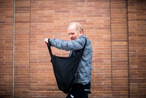 MIKAELA MACKENZIE / WINNIPEG FREE PRESS
Antero Lindblad puts up posters in the Exchange District in Winnipeg on Friday, Sept. 14, 2018.  Lindblad has made his living for over 20 years by doing this, for 25 cents a poster.
Winnipeg Free Press 2018.