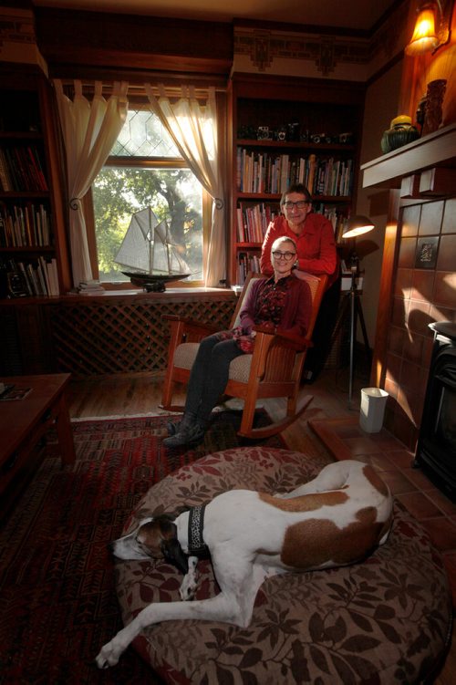 PHIL HOSSACK / WINNIPEG FREE PRESS - David Firman, his wife Gail Perry and their Greyhound Styxx at home Tuesday afternoon. See Borders story by Kittie Wong. - Sept 18, 2018
