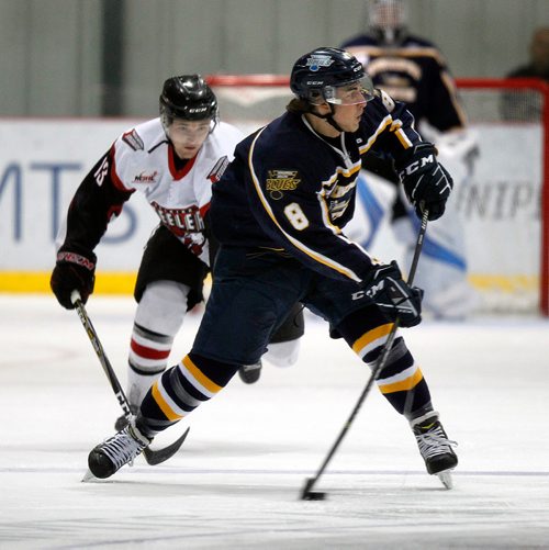 PHIL HOSSACK / WINNIPEG FREE PRESS - Winnipeg Blues #8 Dylan Cassie breaks away from Selkirk Steeler #13 Ryan Sokolowski in action at the IcePlex Tuesday night. - Sept 18, 2018