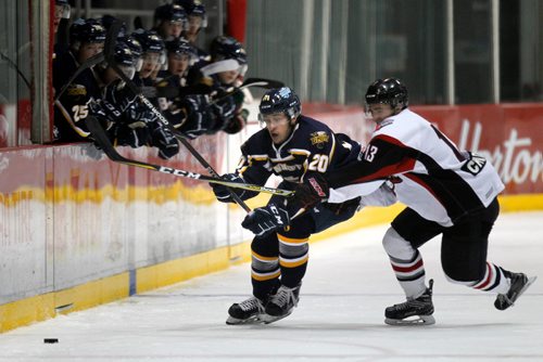 PHIL HOSSACK / WINNIPEG FREE PRESS - Winnipeg Blues #20 Codey Behun races for the puck ahead of  Selkirk Steeler #13 Ryan Sokolowski in action at the IcePlex Tuesday night. - Sept 18, 2018