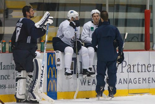 MIKE DEAL / WINNIPEG FREE PRESS
Winnipeg Jets' Bryan Little (18) and Nikolaj Ehlers (27) talk to assistant coach Jamie Kompon during training camp Wednesday morning at the BellMTS Iceplex.
180919 - Wednesday, September 19, 2018.