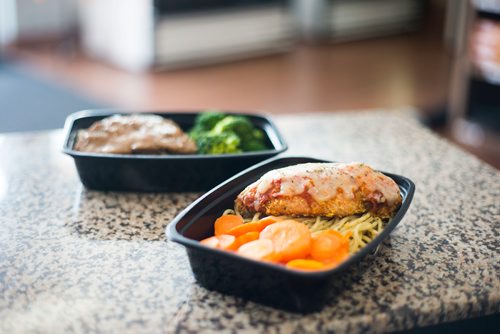 MIKAELA MACKENZIE / WINNIPEG FREE PRESS
The "heat and eat" chicken parmesan and meatloaf with broccoli at Supper central, a pre-prepared meal service, in Winnipeg on Wednesday, Sept. 19, 2018.  
Winnipeg Free Press 2018.