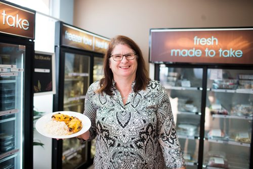 MIKAELA MACKENZIE / WINNIPEG FREE PRESS
Louise Nowak, owner of Supper central, poses with the Chicken Dij-ilicious in Winnipeg on Wednesday, Sept. 19, 2018.  
Winnipeg Free Press 2018.