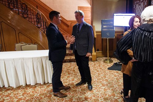 MIKE DEAL / WINNIPEG FREE PRESS
Former Mayor Glen Murray and current Mayor Brian Bowman chat just before the start of a luncheon keynote at the Fort Garry Hotel by Jan Gehl a Danish architect and urban design consultant based in Copenhagen. The conference hosted by The Winnipeg Chamber of Commerce centres around Winnipegs future.
180919 - Wednesday, September 19, 2018.