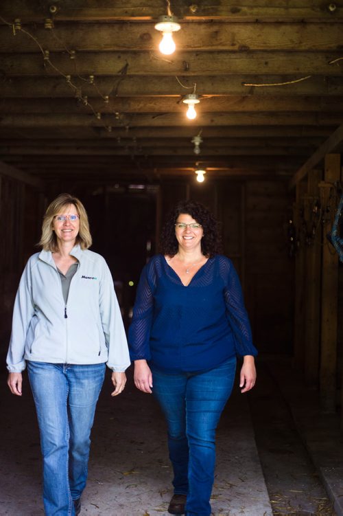 MIKAELA MACKENZIE / WINNIPEG FREE PRESS
Taralea Simpson (left) and Tracy Wood walk through the barn at Farm Away, just outside of Portage la Prairie, on Wednesday, Sept. 19, 2018.  
Winnipeg Free Press 2018.