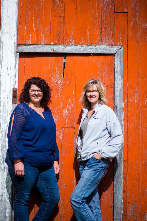 MIKAELA MACKENZIE / WINNIPEG FREE PRESS
Tracy Wood (left) and Taralea Simpson pose in front of the barn at Farm Away, just outside of Portage la Prairie, on Wednesday, Sept. 19, 2018.  
Winnipeg Free Press 2018.