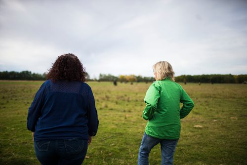 MIKAELA MACKENZIE / WINNIPEG FREE PRESS
Tracy Wood (left) and Taralea Simpson, owners of Farm Away, walk through the cattle field of their family farm just outside of Portage la Prairie on Wednesday, Sept. 19, 2018.
Winnipeg Free Press 2018.