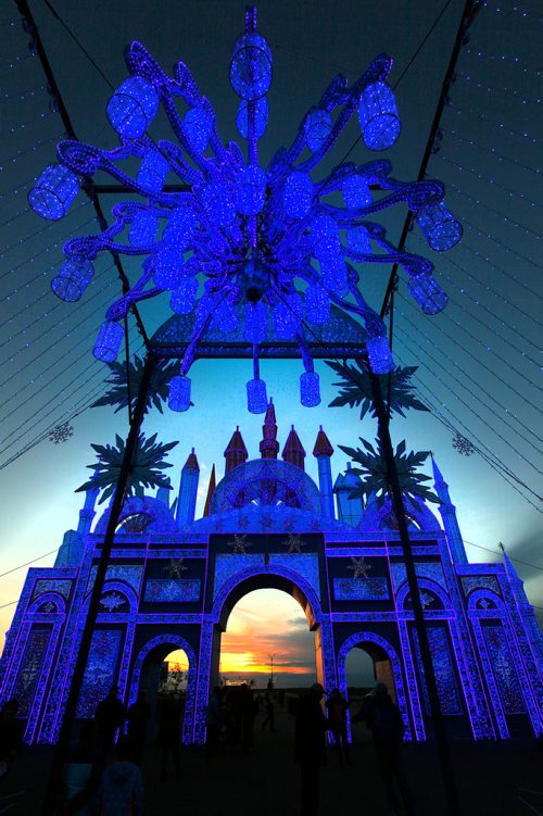 PHIL HOSSACK / WINNIPEG FREE PRESS -  The Main Gate to Lights of the North glows blue as the sun sets Friday evening at Exhibition Park. The dragon is made of over 100,000 Chinese serving platters tied together with simple string. In addition to the chinese lantern displays the show features a Chines acrobatic dance performance, Cultural arts and food. - Sept 21, 2018