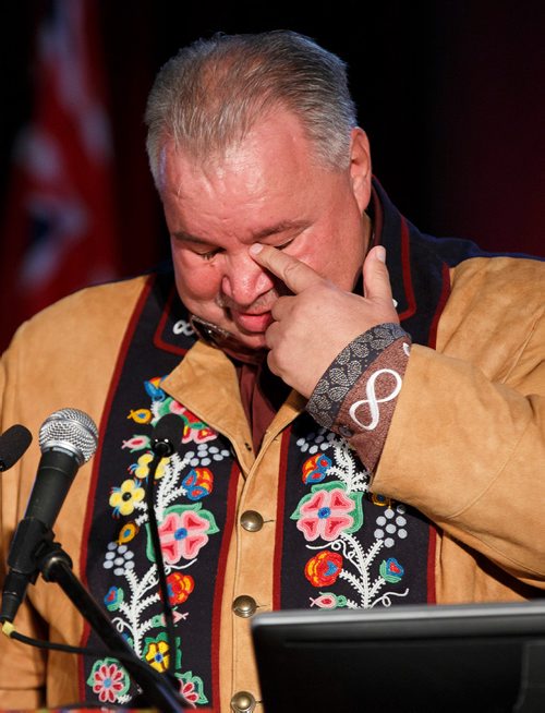 MIKE DEAL / WINNIPEG FREE PRESS
David Chartrand, President of the Manitoba Metis Federation, gets emotional during his speech prior to the announcement with Carolyn Bennett, Minister of Crown-Indigenous Relations, regarding a three-part plan that includes a self-government deal and $154.3M in funding to support that during the opening ceremonies of the Manitoba Metis Federations Annual General Assembly.
180922 - Saturday, September 22, 2018.