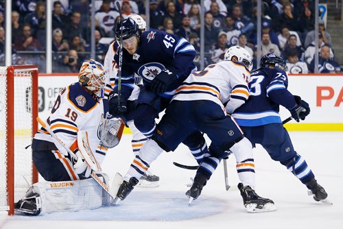 JOHN WOODS / WINNIPEG FREE PRESS
Winnipeg Jets' Dennis Everberg (45) makes his way through the crowd in front of Edmonton Oilers goaltender Mikko Koskinen (19) during second period pre-season NHL action in Winnipeg on Sunday, September 23, 2018.