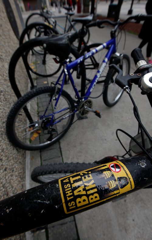 PHIL HOSSACK / WINNIPEG FREE PRESS - Bait Bike stickers on bicycle lock racks downtown at the Millenium Library. See story.  - Sept 24, 2018