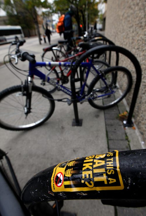 PHIL HOSSACK / WINNIPEG FREE PRESS - Bait Bike stickers on bicycle lock racks downtown at the Millenium Library. See story.  - Sept 24, 2018