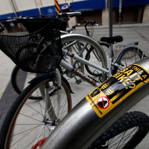 PHIL HOSSACK / WINNIPEG FREE PRESS - Bait Bike stickers on bicycle lock racks downtown at the Millenium Library. See story.  - Sept 24, 2018