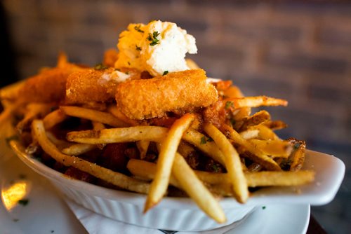 MIKAELA MACKENZIE / WINNIPEG FREE PRESS
The mozza stick lasagna poutine at Leopold's Tavern in South Osborne in Winnipeg on Tuesday, Sept. 25, 2018.  Winnipeg Free Press 2018.