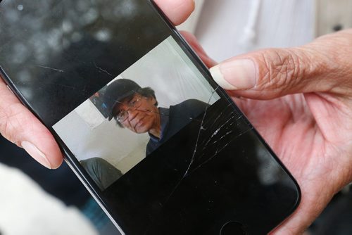 JOHN WOODS / WINNIPEG FREE PRESS
David Harper's sister Gladys Harper holds her phone with a photo of David outside Seven Oaks Hospital Tuesday, September 25, 2018. Harper's family was told by the hospital that he had discharged when in fact he had died earlier in the day.