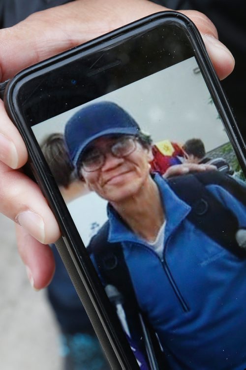 JOHN WOODS / WINNIPEG FREE PRESS
David Harper's sister Nora Whiteway holds her phone with a photo of David outside Seven Oaks Hospital Tuesday, September 25, 2018. Harper's family was told by the hospital that he had discharged when in fact he had died earlier in the day.