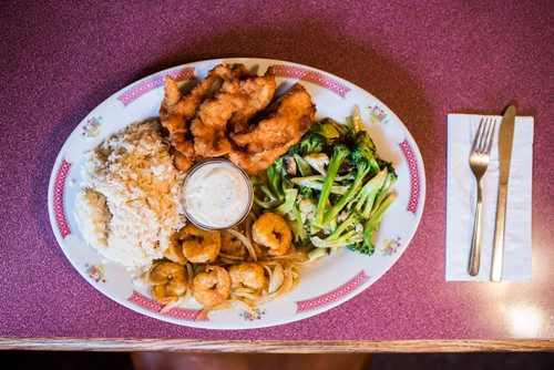 MIKAELA MACKENZIE / WINNIPEG FREE PRESS
The chicken fingers, mixed greens, pan-fried whole shrimp, and fried rice at Mitzi's Chicken Finger Restaurant in Winnipeg on Wednesday, Sept. 26, 2018.  Winnipeg Free Press 2018.