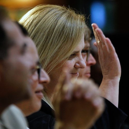 PHIL HOSSACK / WINNIPEG FREE PRESS - Jennifer Motkaluk waves as she's introduced to members of the audience at a Mayoral Forum held at the Forks Wednesday evening.  - Sept 26, 2018