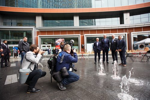 MIKE DEAL / WINNIPEG FREE PRESS
Posing for a photo during a break in the rain (from left); Jim Ludlow, President, True North Real Estate Development, Brian Pallister, Premier of Manitoba, Hartley Richardson, President & CEO, James Richardson & Sons Limited, and Mayor Brian Bowman.
True North Real Estate Development celebrated the official opening of True North Square's public plaza Thursday afternoon inside the lobby of 242 Hargrave because of inclement weather..
180927 - Thursday, September 27, 2018.