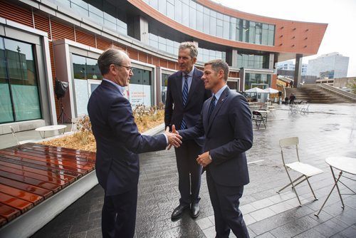 MIKE DEAL / WINNIPEG FREE PRESS
Shaking hands after the opening (from left); Jim Ludlow, President, True North Real Estate Development, Brian Pallister, Premier of Manitoba, and Mayor Brian Bowman during the opening of True North Square's public plaza.
True North Real Estate Development celebrated the official opening of True North Square's public plaza Thursday afternoon inside the lobby of 242 Hargrave because of inclement weather..
180927 - Thursday, September 27, 2018.