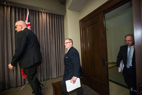 MIKAELA MACKENZIE / WINNIPEG FREE PRESS
Finance Minister Scott Fielding (centre) walks to the podium with other finance department officials before speaking to the media about the newly released public accounts at the Manitoba Legislative Building in Winnipeg on Friday, Sept. 28, 2018.  Winnipeg Free Press 2018.