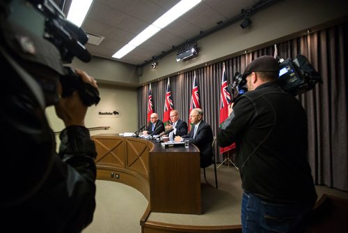 MIKAELA MACKENZIE / WINNIPEG FREE PRESS
Finance Minister Scott Fielding (centre) and other finance department officials speak to the media about the newly released public accounts at the Manitoba Legislative Building in Winnipeg on Friday, Sept. 28, 2018.  Winnipeg Free Press 2018.