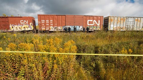 MIKE DEAL / WINNIPEG FREE PRESS
Police at the scene of a CN rail line where a person was hit by a train close to Wilks Ave. and Shaftesbury Blvd. Friday morning.
180928 - Friday, September 28, 2018.