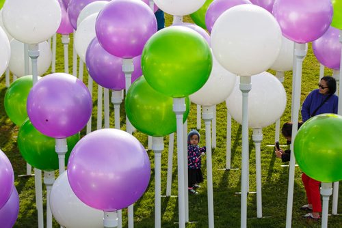 MIKE DEAL / WINNIPEG FREE PRESS
Arlene Valenzuela takes a photo of her 18-month-old daughter, Alessia, as they check out an immersive art installation hosted by Telus on the hill by the CN Stage and Field at The Forks for Culture Days and Nuit Blanche.
180929 - Saturday, September 29, 2018.