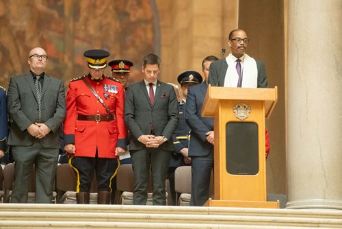 MIKE SUDOMA / WINNIPEG FREE PRESS RCMP 
Chaplain, Ray Cornish, leads the audience in prayer during the Manitoba Police and Peace Officers Memorial Service Sunday morning at the Legislature. September 30, 2018