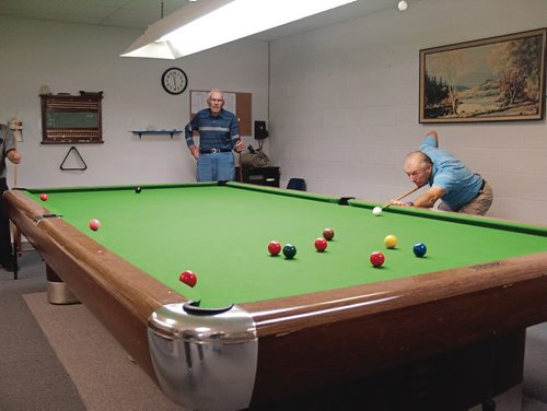 Canstar Community News Members of the Transcona Retired Citizens Organization enjoy using the billiard tables at 324 Whittier Ave. (SHELDON BIRNIE/CANSTAR/THE HERALD)