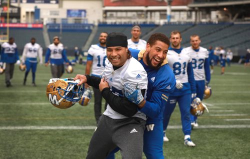 RUTH BONNEVILLE / WINNIPEG FREE PRESS

Winnipeg Blue Bombers practice at Investors Group Field Tuesday.

#45 Santos Knox and #27 goof around at end of practice.  

October 2nd, 2018