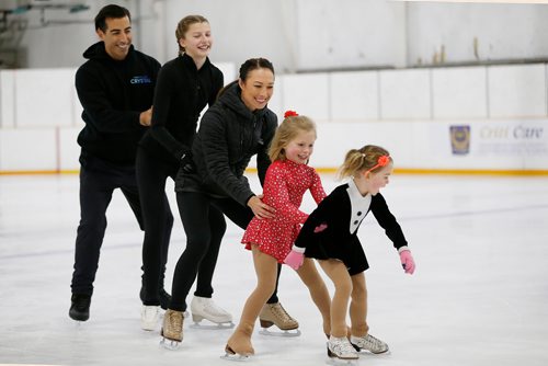 JOHN WOODS / WINNIPEG FREE PRESS
Local skater and Cirque du Soleil performer Robin Johnstone, centre, and her skating partner and husband Andy Buchanan skate with, from left, Emma King and sisters Sadie and Mabel Graetz at a homecoming of sorts as they skated at the Winnipeg Winter Club, Johnstone's home ice, prior to their Circue du Soleil show Crystal Tuesday, October 2, 2018.