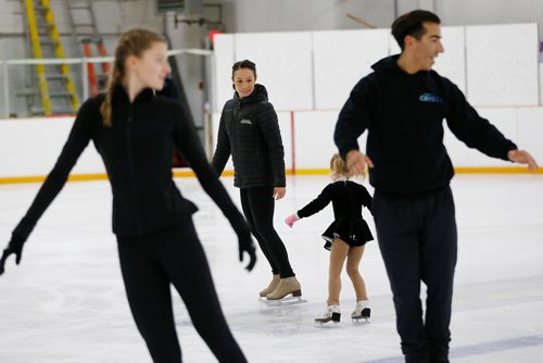 JOHN WOODS / WINNIPEG FREE PRESS
Local skater and Cirque du Soleil performer Robin Johnstone and her skating partner and husband Andy Buchanan skate with Emma King, front, and Mabel Graetz at a homecoming of sorts as they skated at the Winnipeg Winter Club, her home ice, prior to their Circue du Soleil show Crystal Tuesday, October 2, 2018.