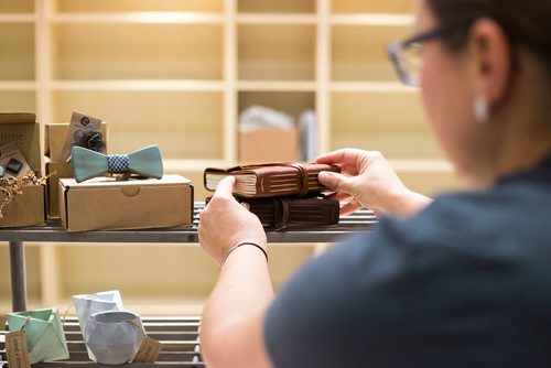 MIKAELA MACKENZIE / WINNIPEG FREE PRESS
Melissa Penner of Made Here sets up items, which will be opening at the Portage and Main Concourse this Thursday, displays products from local makers and artisans with a portion of proceeds going to children's charities in Winnipeg on Wednesday, Oct. 3, 2018.  Winnipeg Free Press 2018.