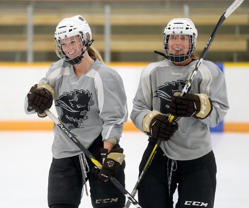 TREVOR HAGAN / WINNIPEG FREE PRESS
Manitoba Bisons' forward Karissa Kirkup (41) and defenseman Brielle Dacquay-Neveux (2) during practice today, Wednesday, October 3, 2018.