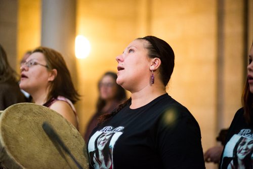 MIKAELA MACKENZIE / WINNIPEG FREE PRESS
Carrie Blaydon sings with the Dancing Spirit drum group at an event celebrating the lives of missing and murdered indigenous women and girls at the Manitoba Legislative Building in Winnipeg on Thursday, Oct. 4, 2018.  Winnipeg Free Press 2018.