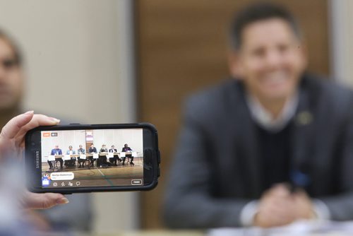 TREVOR HAGAN / WINNIPEG FREE PRESS
A spectator films the the Mayoral debate as Mayor Brian Bowman listens to a question at Winnipeg Grand Mosque on Waverley Street, Friday, October 5, 2018.