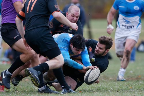 JOHN WOODS / WINNIPEG FREE PRESS
University of Manitoba Wombats can't stop Assassins' Johnny Alongi (7) from scoring the try in the Manitoba Men's Rugby Division 1 Championship game Saturday, October 6, 2018, but it was a little too late as the Wombats went on to defeat the Assassins.