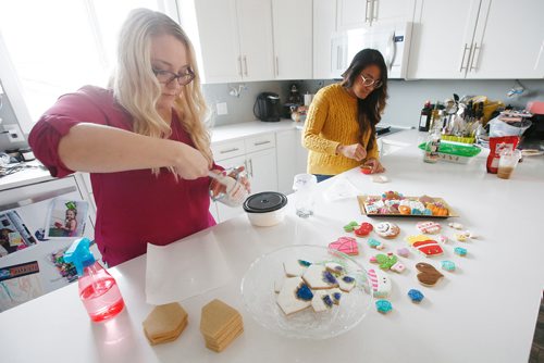 JOHN WOODS / WINNIPEG FREE PRESS
Jenn Strauman, left, and Mary Lou Vendivil, owners of Scientific Sweets, a two-year-old home-based cookie biz that made headlines in June when Khloe Kardashian ordered cookies, in the image of her new baby, are photographed in Strauman's home Monday, October 8, 2018.