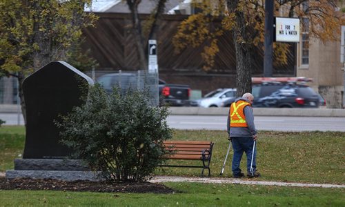 MIKE DEAL / WINNIPEG FREE PRESS
Winnipeg City Parks department employees check Vimy Ridge Park for needles after images of around a dozen discarded needles were posted to Facebook this morning. 
181009 - Monday, October 9, 2018