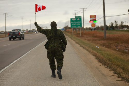 RUTH BONNEVILLE / WINNIPEG FREE PRESS

Standup photo 
Captain Wright Eruebi makes his way into Winnipeg down #1 highway and Portage Ave.  on the last day of his 200 km trek from Canadian Forces Base (CFB) Shilo to CFB Winnipeg for families Tuesday morning.

More info:
Social Media
Facebook: facebook.com/TrekForFamilies  @TrekForFamilies
Twitter: twitter.com/TrekForFamilies @TrekForFamilies
Donation link http://bit.ly/TrekForFamilies
Event hashtags being used: #TrekForFamilies #ShiloToWinnipeg




October 9th, 2018
