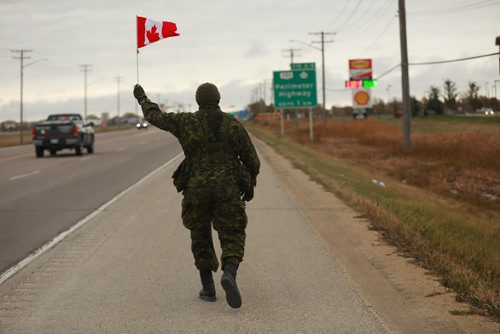 RUTH BONNEVILLE / WINNIPEG FREE PRESS
Standup photo
Captain Wright Eruebi makes his way into Winnipeg down #1 highway and Portage Ave. on the last day of his 200 km trek from Canadian Forces Base (CFB) Shilo to CFB Winnipeg for families Tuesday morning.
More info:
Social Media
Facebook: facebook.com/TrekForFamilies @TrekForFamilies
Twitter: twitter.com/TrekForFamilies @TrekForFamilies
Donation link http://bit.ly/TrekForFamilies
Event hashtags being used: #TrekForFamilies #ShiloToWinnipeg
October 9th, 2018