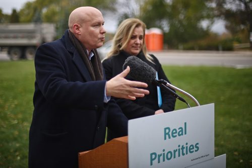 MIKE DEAL / WINNIPEG FREE PRESS

Incumbent Winnipeg councillor for the Elmwood - East Kildonan Ward, Jason Schreyer, declares that he voted early for mayoral candidate Jenny Motkaluk at an infrastructure announcement Motkaluk was making about making the Louise Bridge replacement a major priority if she was elected. 
181009 - Monday, October 9, 2018
