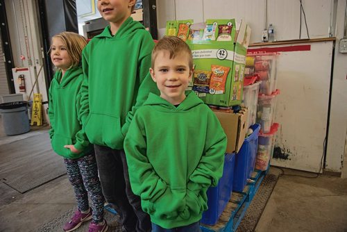 Canstar Community News Oct. 2, 2018 - Maxwell Oliver and his siblings delivered the donations from their Cast-A-Can initiative to Winnipeg Harvest on Oct. 2. (EVA WASNEY/CANSTAR COMMUNITY NEWS/METRO)