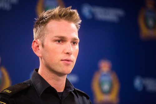 MIKAELA MACKENZIE / WINNIPEG FREE PRESS
Constable Jay Murray speaks about a fraud charge and firearms arrests and concerns at a press conference in Winnipeg on Wednesday, Oct. 10, 2018.
Winnipeg Free Press 2018.