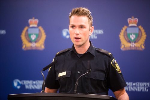 MIKAELA MACKENZIE / WINNIPEG FREE PRESS
Constable Jay Murray speaks about a fraud charge and firearms arrests and concerns at a press conference in Winnipeg on Wednesday, Oct. 10, 2018.
Winnipeg Free Press 2018.