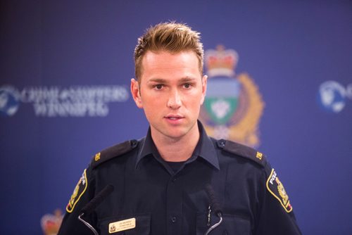 MIKAELA MACKENZIE / WINNIPEG FREE PRESS
Constable Jay Murray speaks about a fraud charge and firearms arrests and concerns at a press conference in Winnipeg on Wednesday, Oct. 10, 2018.
Winnipeg Free Press 2018.